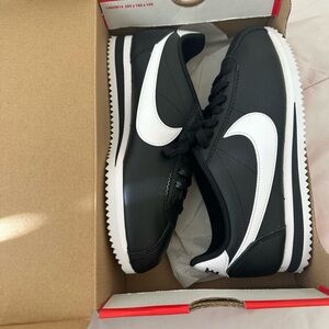 Nike Women’s Black and White Classic Leather Cortez